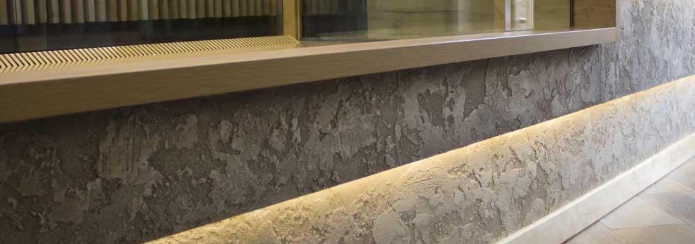 Нанесення штукатурки травертин, приклади